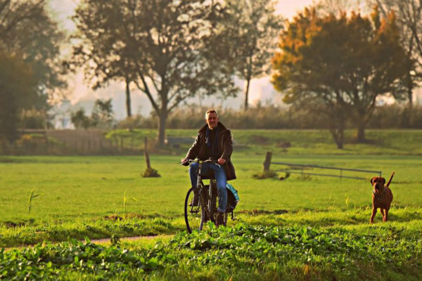 cane e ciclista