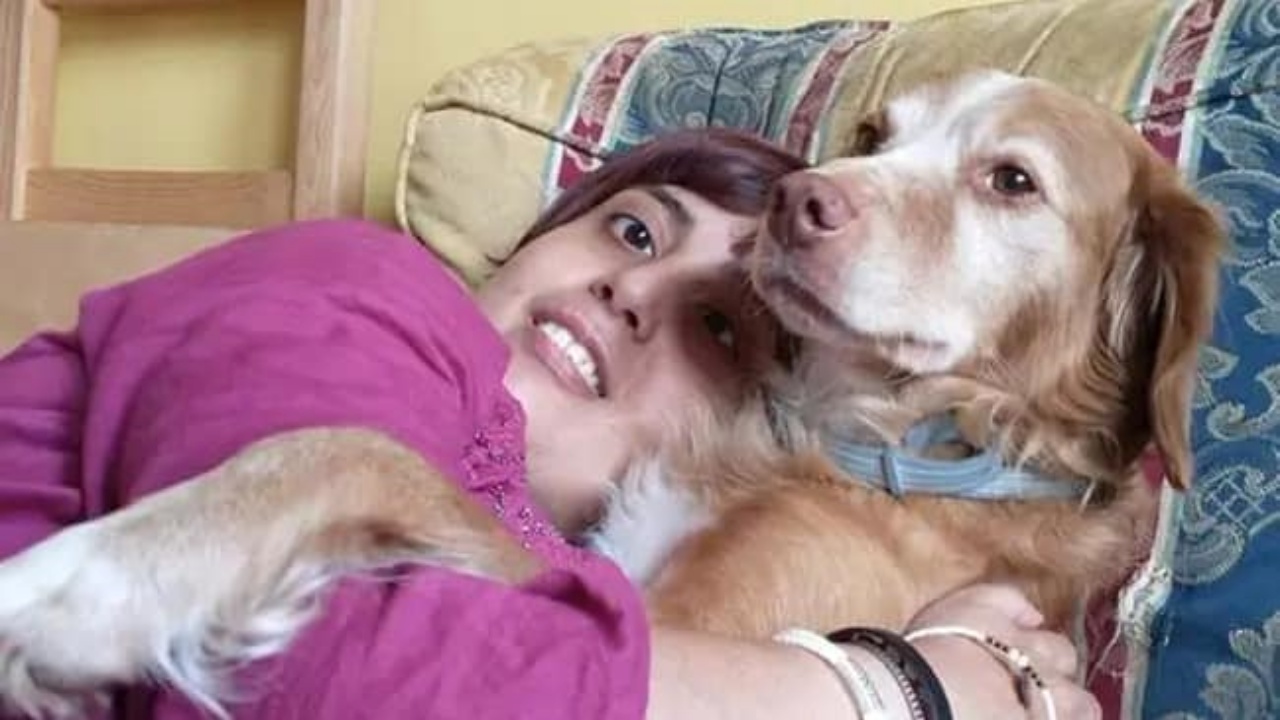 donna cieca e cane guida