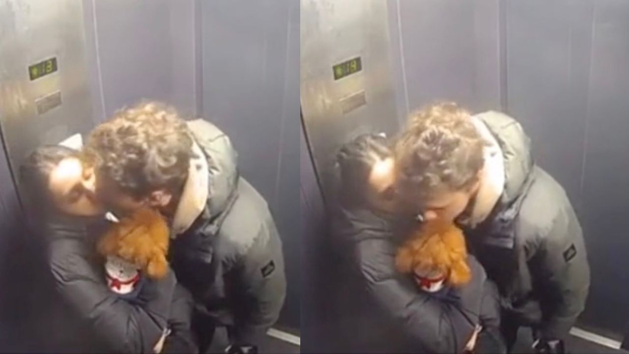 Coppia in ascensore con cane