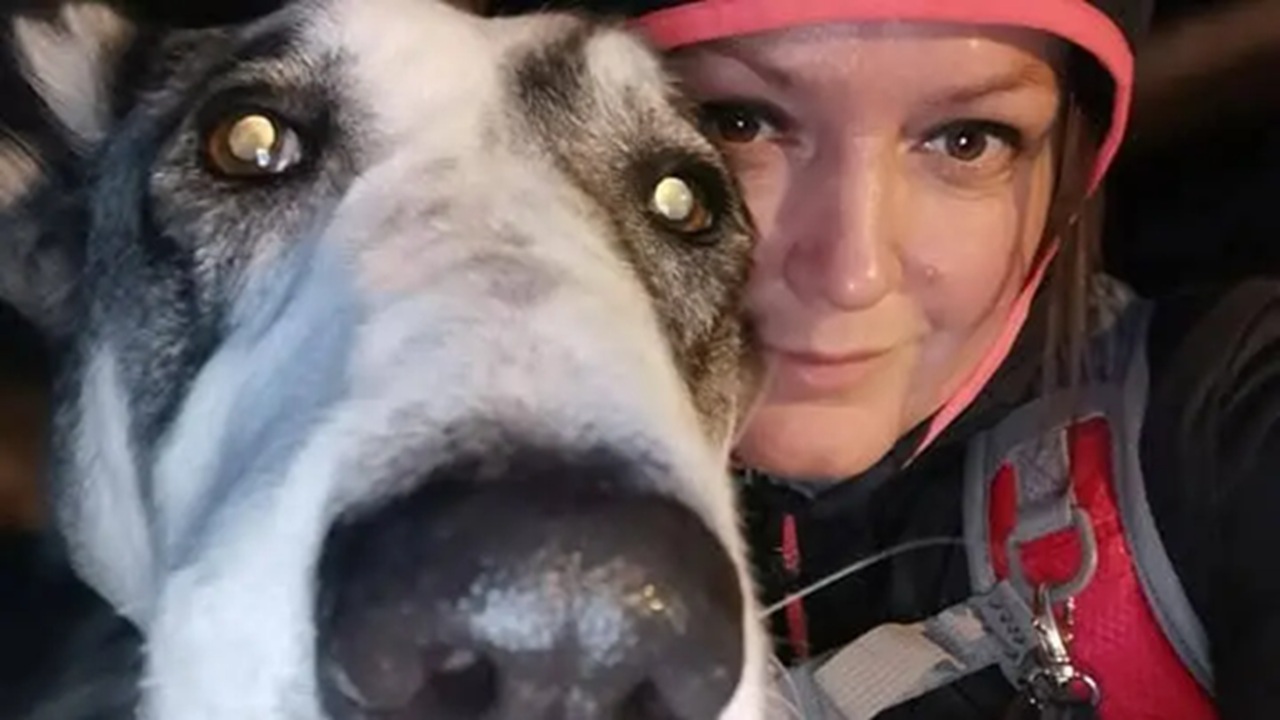 Cane con la proprietaria